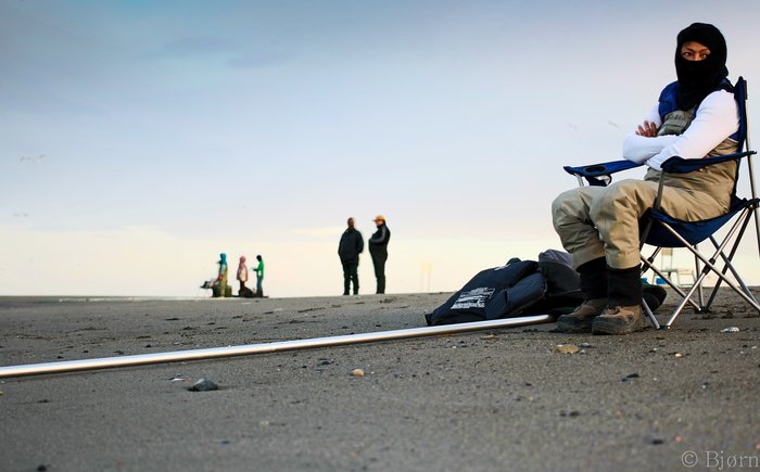 Dipnetting on the Kenai River is open from 6:00 AM to 11:00 PM. This dipnetter is ready and waiting for the opening. 