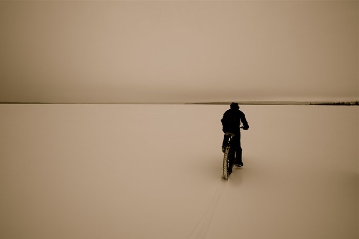Biking on Tustumena Lake.