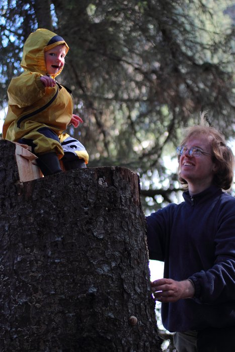 Cutting firewood, Hig cut this stump high, leaving a throne for the kids to play on.
