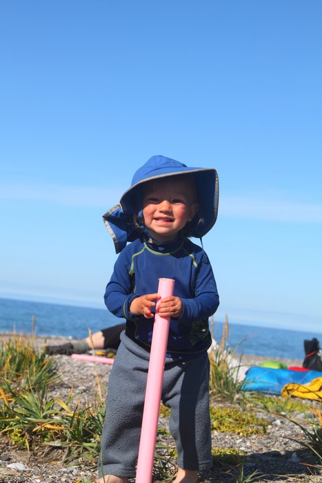 On beach with my pink walk stick