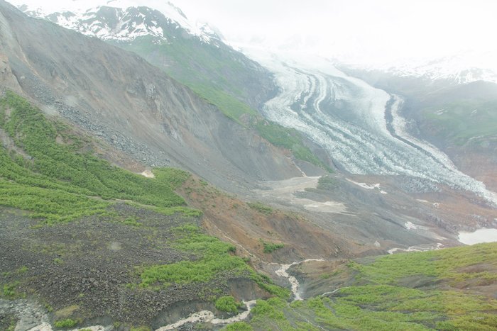A chartered helicopter flies above the landslide. The earth-science researchers used this opportunity to photograph the landslide and get a better perspective of the event. 
