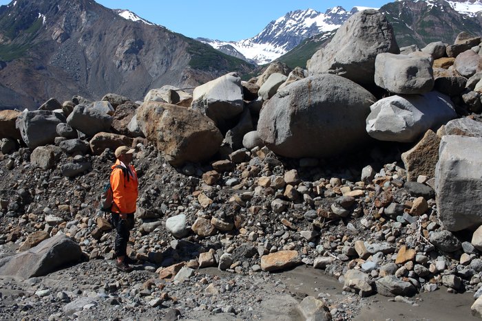 A river-bank exposes the Taan tsunami deposit about 8 month after it formed. The upper layer is composed of sorted boulders, but deeper down there is extremely poorly sorted sediment. Nearby higher banks revealed deposits over 4 m thick from the tsunami, which had a runup of about 190 m.