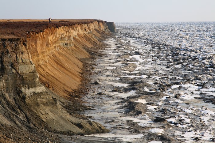 In April, ice floes still pack the shore on the edge of Bristol Bay.