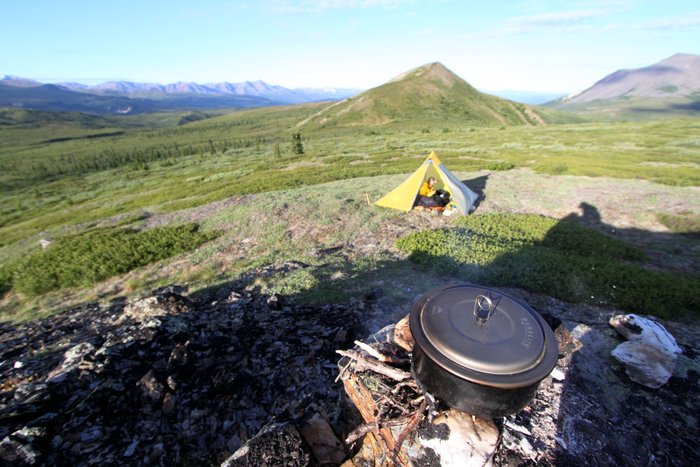 Erin works on packing up while I cook breakfast.