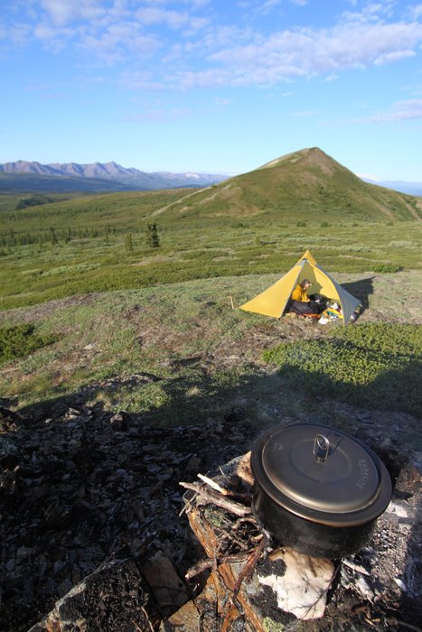 Erin works on packing up while I cook breakfast.