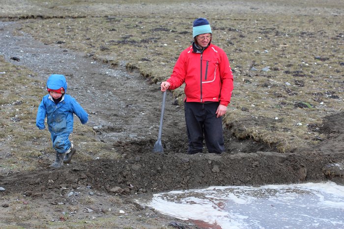 Carrying on a tradition started with his own father, Hig and Katmai built a dam in a tidal slough, waiting for the water to overtake it.