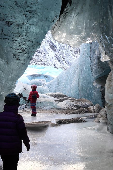 Near the edge of the glacier sediment in the ice gives it a gray cast.