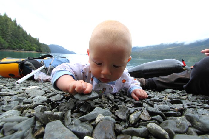 Katmai seems very interested in the way there are so many rocks in the world.