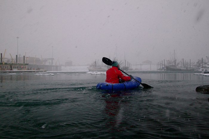 Paddling into the Homer boat harbor.