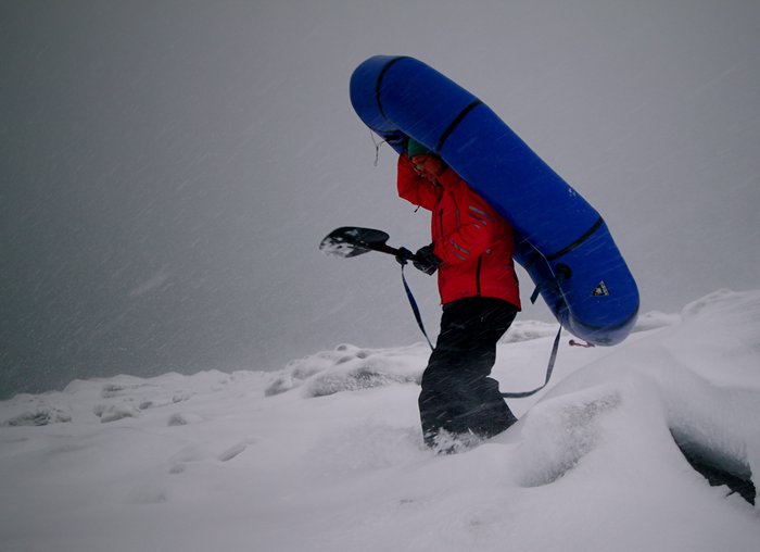 Hig carries through the drifts to the launch.