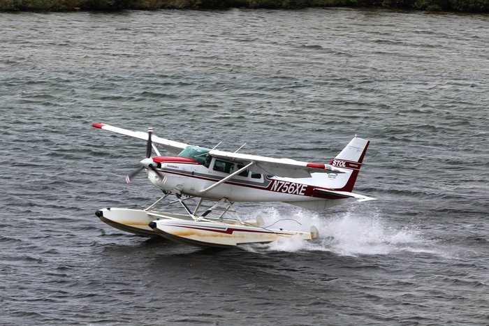 A float plane lands on a small pond near Lake Iliamna.
