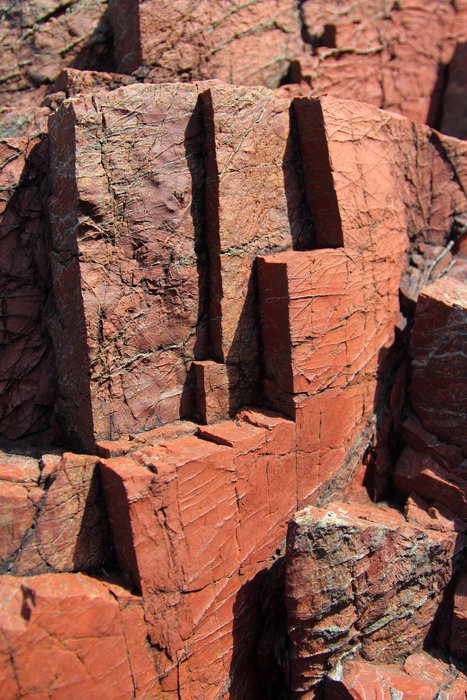 Each fold breaks into intricate blocky steps