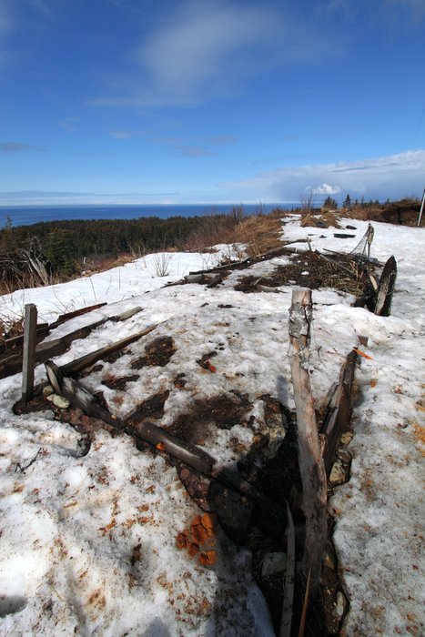 The outlines of the garden beds show up as the snow melts in early May