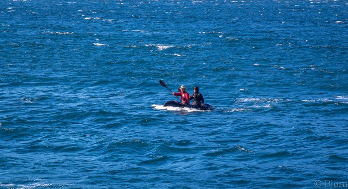 Bjørn and Hig surfing back to shore.