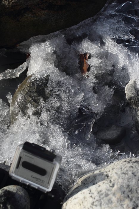 The "HD Helmet Hero" from GoPro has a timelapse function.  I didn't get a chance to mess with it much but I did catch this supercooled spring ice melting in the morning sun.