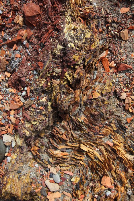 Coal fires melted and stained this rock.