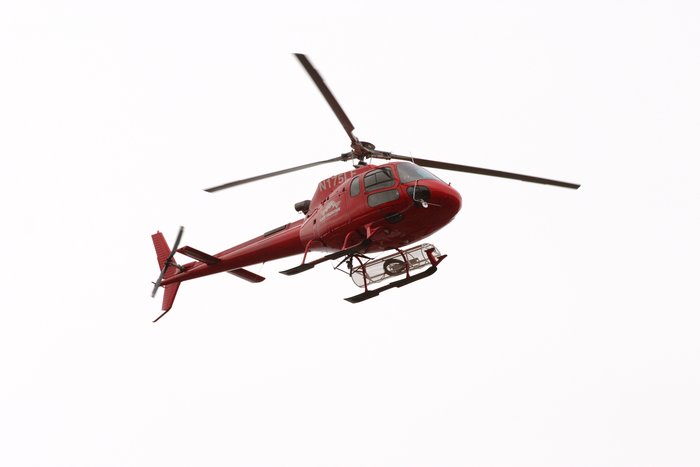 Northern Dynasty helicopter buzzing over the mine site. 