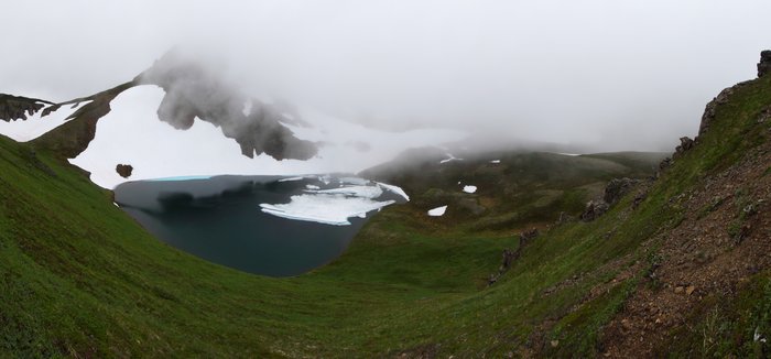 2500 feet above sea level is enough to leave ice on this alpine lake through July.