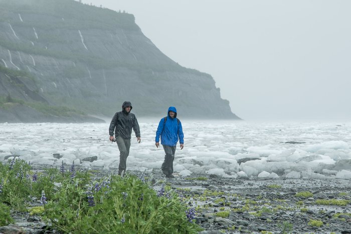 Vasillios Skanavis and Dr. Pat Lynett make their way back to the helicopter after inspecting the coastline for tsunami run-up. 