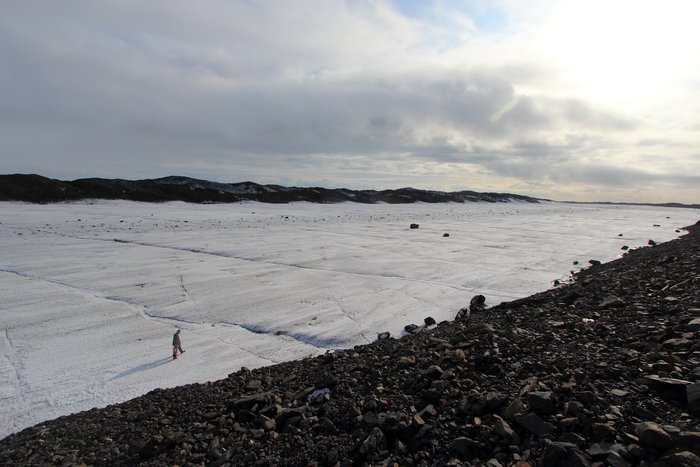 Between high hills of ice insulated by rock, stripes of smooth white ice provided the easiest traveling of the whole trip.