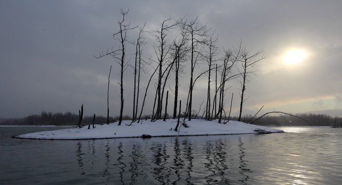 This is the opposite of a desert islet... frozen and snowy in one of the wettest places on earth.