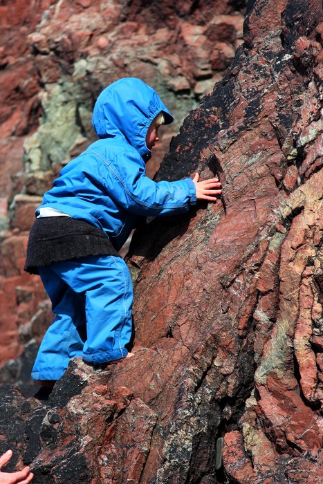 Climbing the folded chert cliff at McDonald Spit