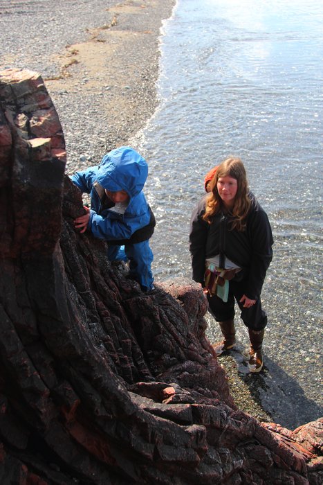 Testing his climbing skills on the folded chert at McDonald Spit