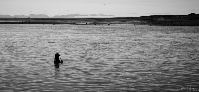 Drifting with the ebb current.