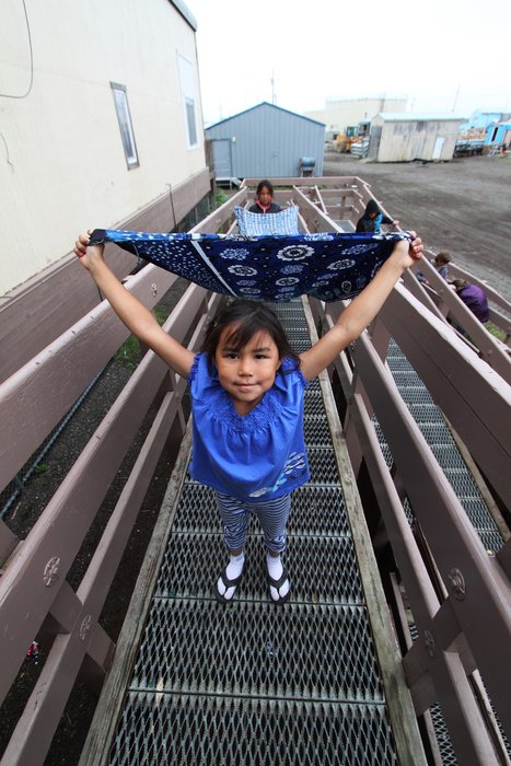 Mikayla is one of Katmai's fans.  Here she festoons herself with Katmai's carrying wrap at Kivalina school.