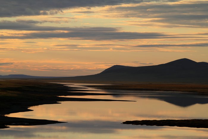 Still water in a brackish lagoon along the Chukchi coast.