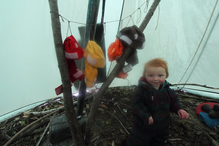 Diaper outsides dry next to the stove.