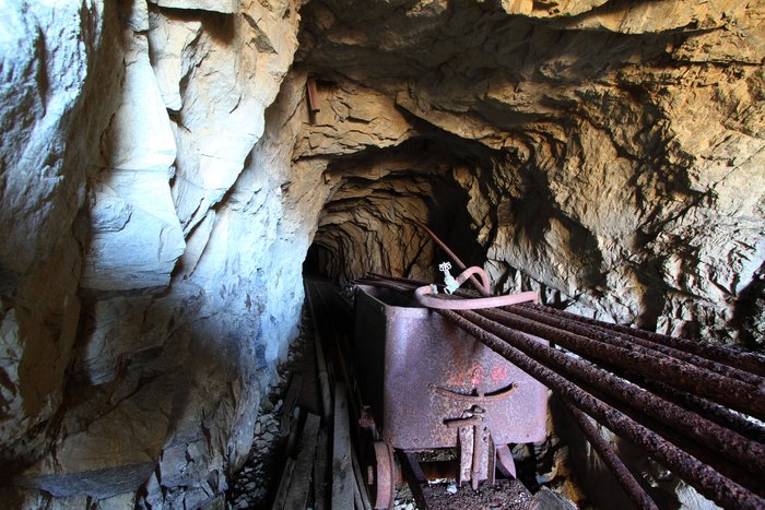This rail car full of pipes looks ready to send into the mine, but it's been sitting here for over 50 years.