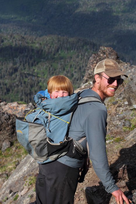 We got over-ambitious climbing Poot Peak, and found ourselves in a position where we needed to safely carry Lituya down the mountain.  Putting her in the pack worked well.