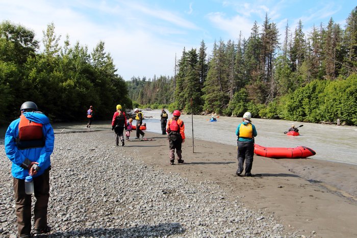 A narrow piece of the lower Wosnesenski River left us peering around the corner - eventually two experienced rafters ran to confirm that there were no major sweepers.