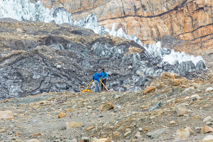 The marine survey crew works from the Western shore of Taan Fjord, near the glacier snout, atop landslide debris. Over the course of a week, the marine survey team mapped several shallow-water locations but most importantly near Tyndall Glacier, where the landslide occurred. 