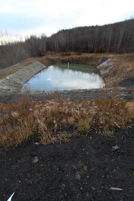 Two ponds alternate in the role of settling sediment carried by a stream coming out of the old Evan Jones coal mine.