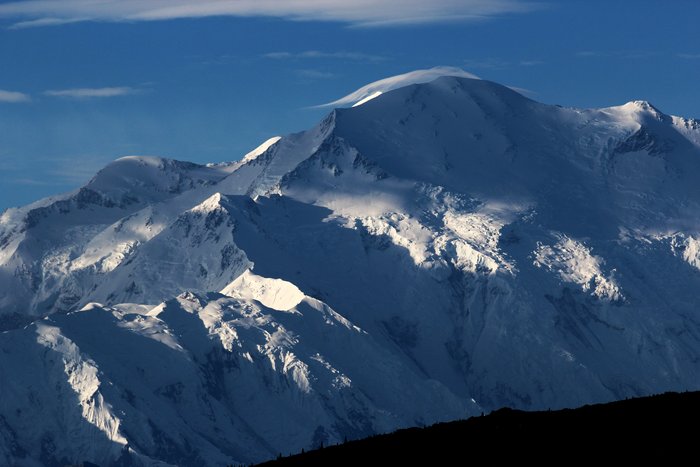 Spotty light on a big big mountain.