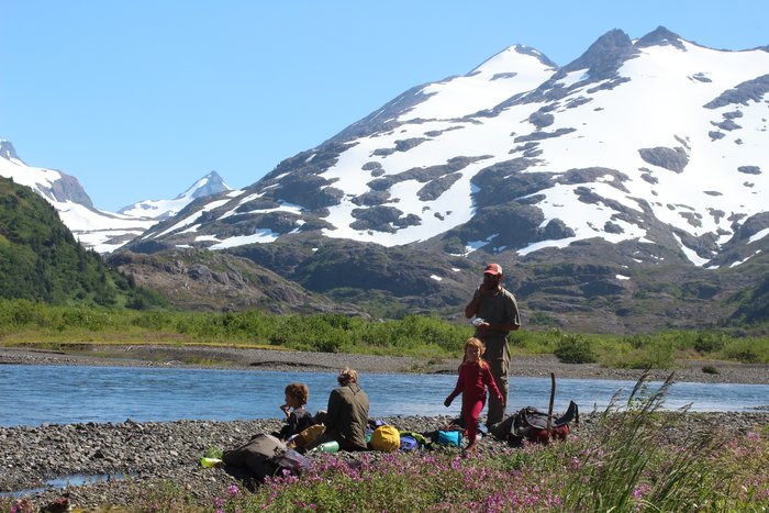Relaxing next to the creek ford spot in the upper Tutka valley