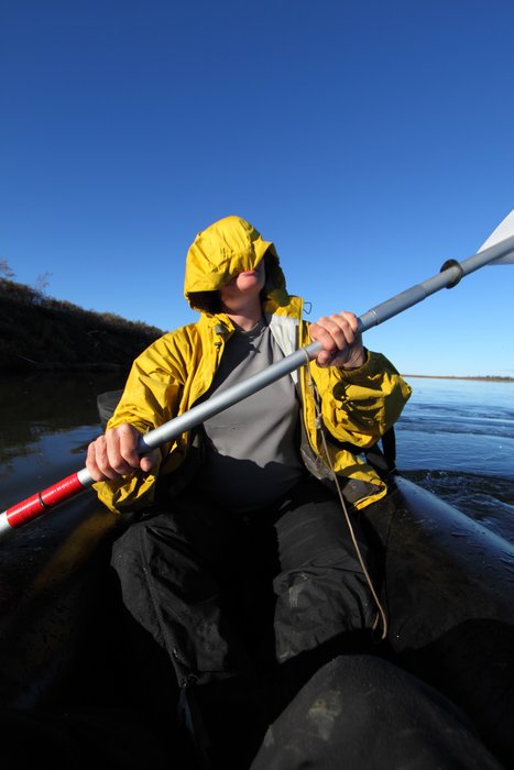 Lacking sunglasses or a sun hat, my rain hood serves as a makeshift sun shade.