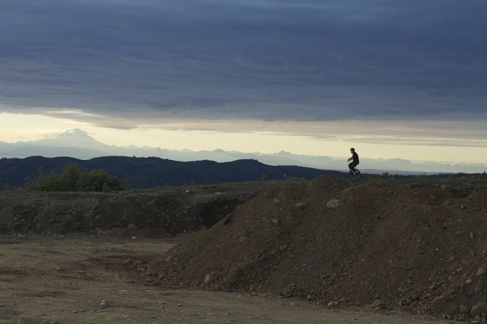 Bjørn unicycling on Ohlson Mountain.