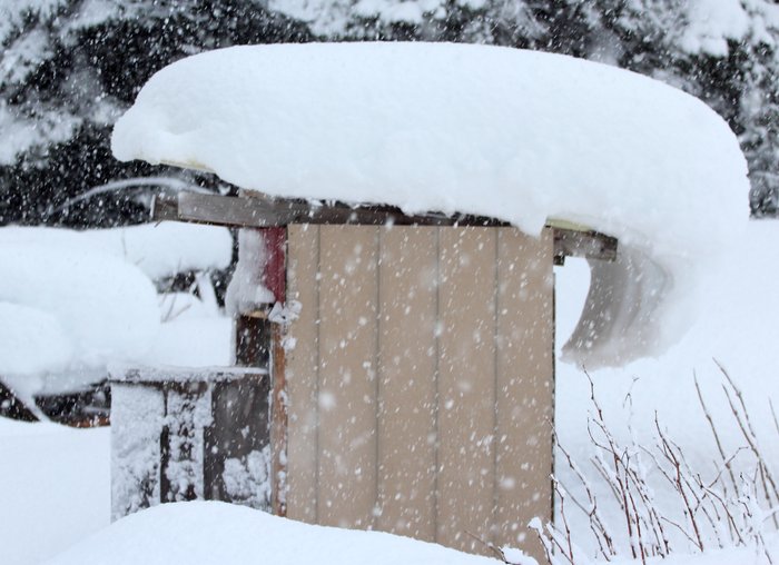 The door is several feet down from the surrounding snowpack, as I keep digging it free.  Soon we'll be tunneling down in.