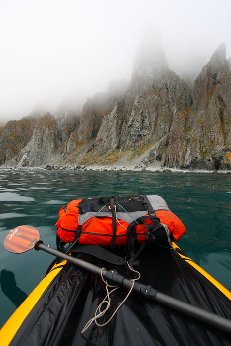 On Unimak Island, <a href="http://www.groundtruthtrekking.org/Journeys/WildCoast.html">packrafts brought us around cliffy headlands</a> (even after the bear shredding and subsequent repair).