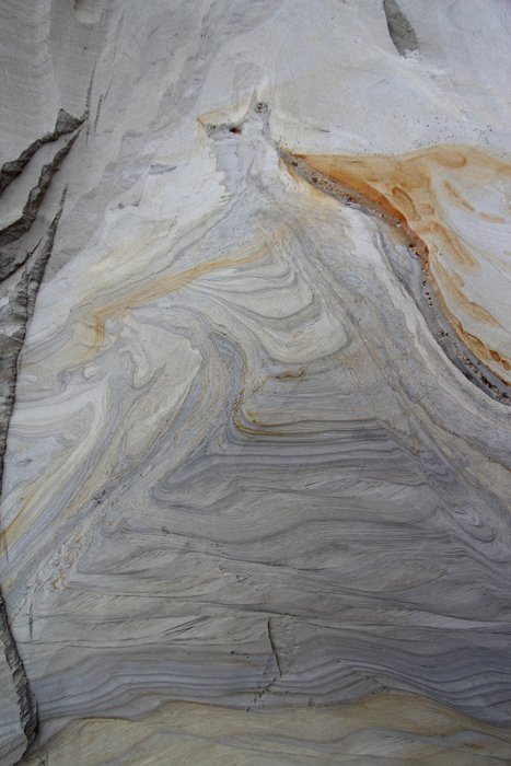Climbing ripples visible at center-bottom transition to swirled deformed sediment at the base of a large liquefaction feature on Lake Iliamna.