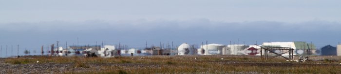 Heat rising from sun-warmed gravel and cool Chukchi Sea breezes mix to turn the village into a mirage.