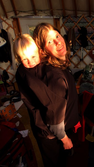 Hig has been running the old clunker sewing machine through a number of rubber bands (our replacement for sewing machine belts), making the most crucial gear for our Malaspina expedition.