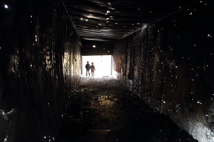 Thousands of bullet holes riddle this abandoned van near Jonesville Coal Mine.