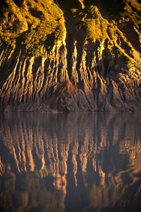 The southern shore of the lake at the base of Grewinck glacier.  Rock slides could be heard regularly from this very steep face.