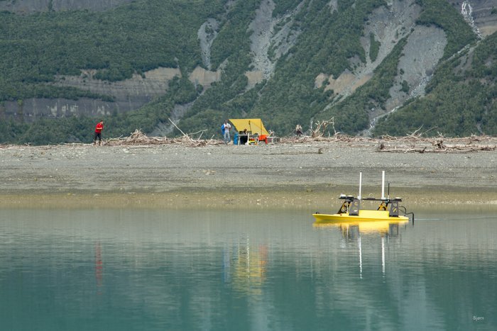 This small, remote control boat, maps the sea floor in front of the Taan Fjord camp. This area is full of kettles and was overrun with sediment from the October, 2016 landslide generated tsunami. 