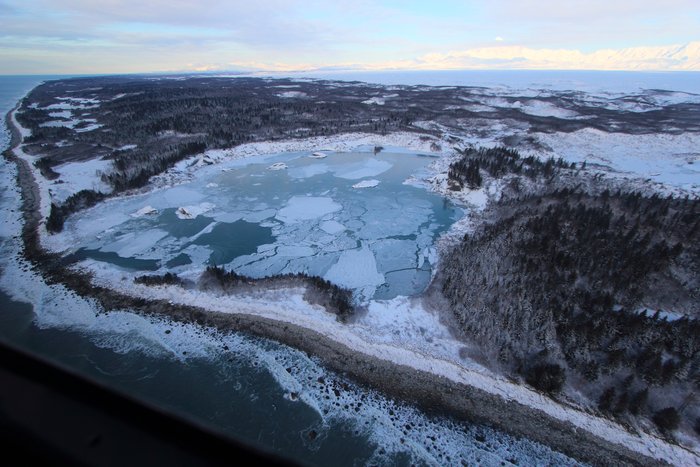 Once this was the Sitkagi Bluffs, but now the ice is melting and lakes and lagoons replace the towering ice.