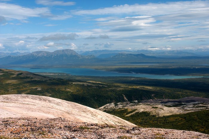 Looking down at Sixmile Lake, the village of Nondalton, and surrounding forests. Nondalton is one of the closest villages to the mine site.